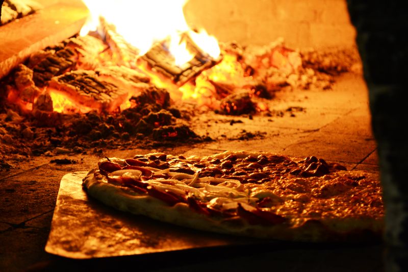 Anthony's coal fired pizza fresh out of the coal oven
